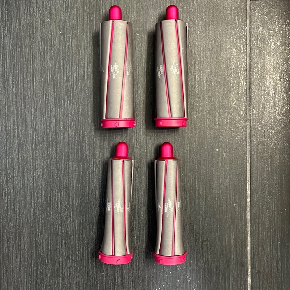 Dyson air wrap short barrels. All in perfect working condition.